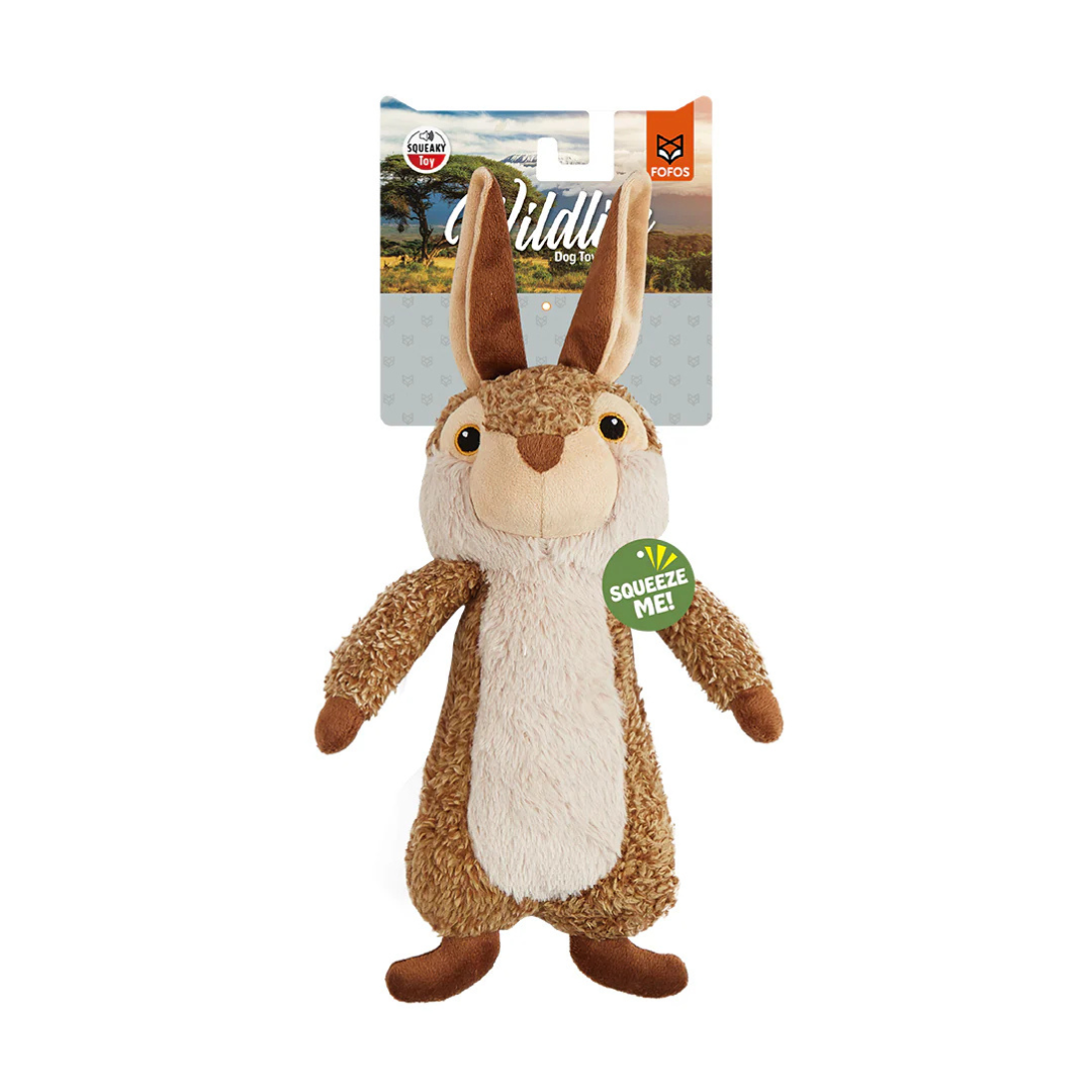 FOFOS Wildlife Plush Rabbit Dog Toy, a soft brown and cream plush hare with long ears, showing a "Wildlings Dog Toy" tag and a "SQUEEZE ME!" circle.